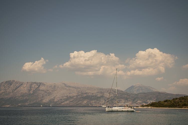 Sailboat Anchored On Sea