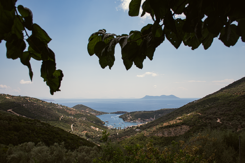 Free Breathtaking view of Syvota's coastline with lush green mountains and the serene sea. Stock Photo