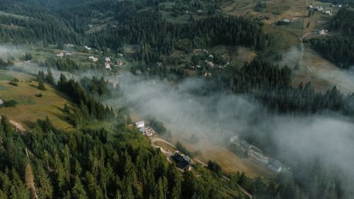 Free A breathtaking aerial view of Yablunytsya's misty landscape, nestled in Ivano-Frankivsk Oblast, Ukraine. Stock Photo