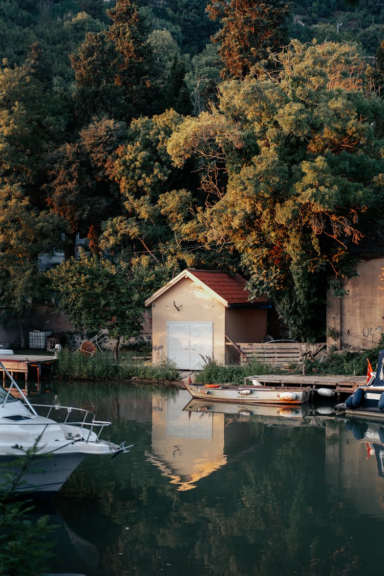 Boathouse Beside A Lake