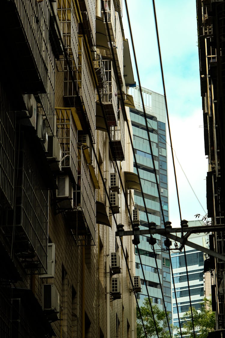 Modern High Rise Building Seen From Narrow Street