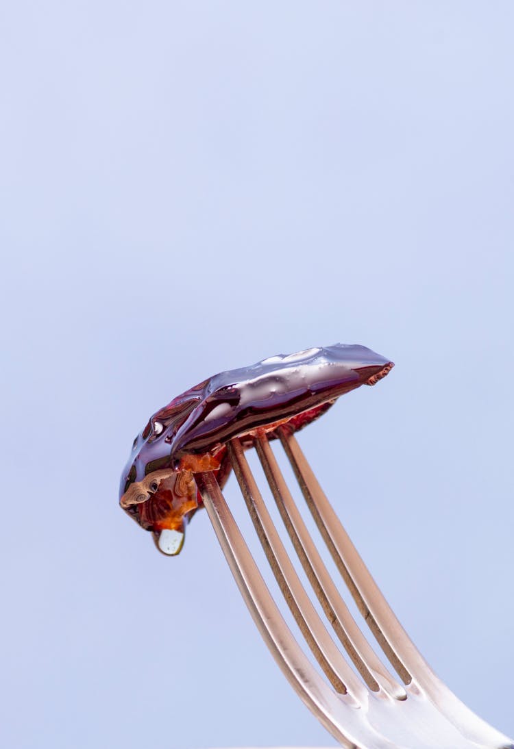 Close-Up Shot Of Fork With Food