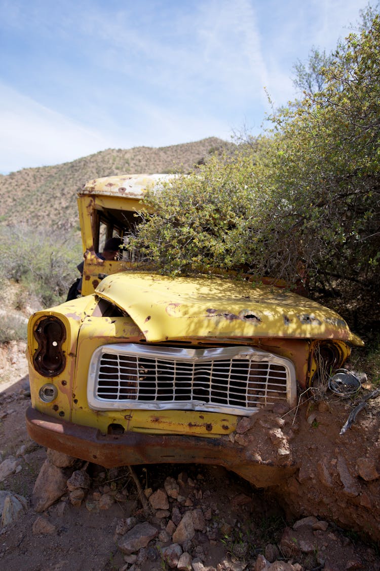 Yellow Junk Bus On The Desert