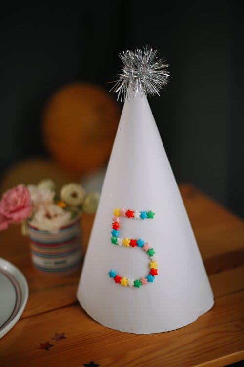 Free Decorated Hat for Fifth Birthday Stock Photo