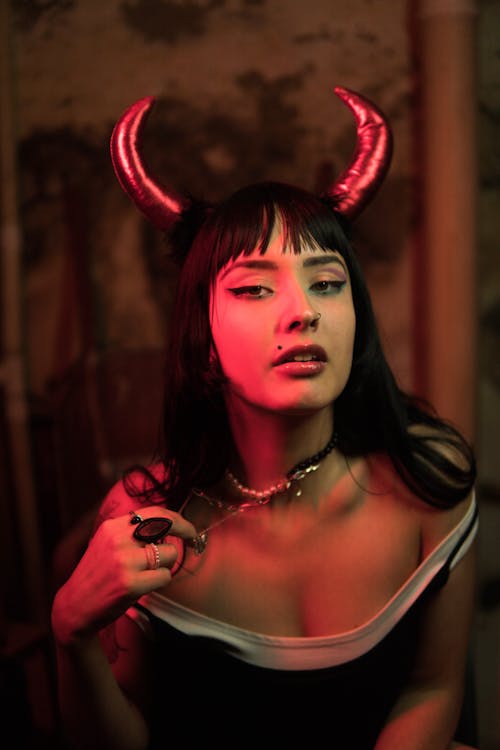 Free Woman with Devil Horns Stock Photo