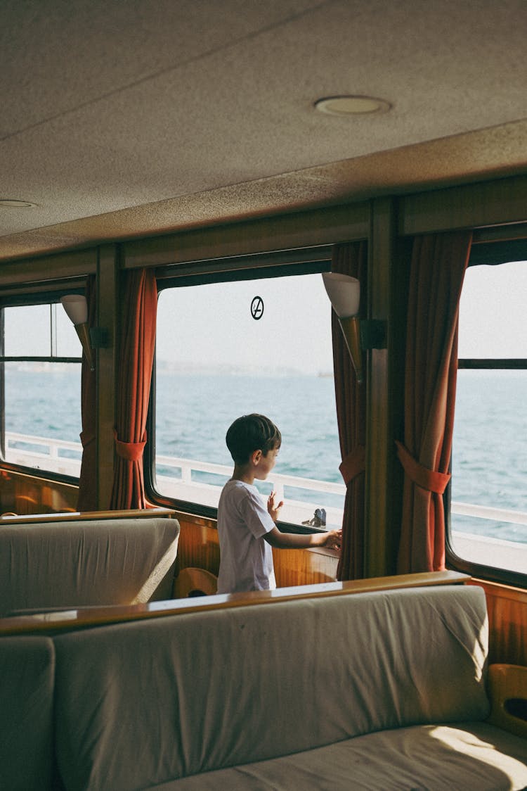 Child Near Window In Boat