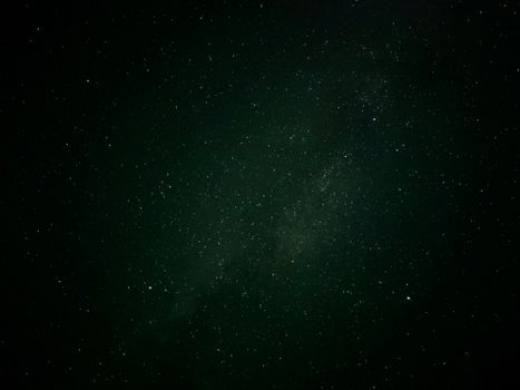 Capture the beauty of the galaxy with this starry night sky image, perfect for backgrounds and wallpapers.