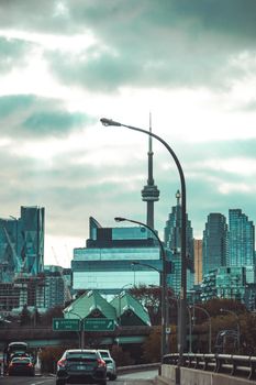 Explore Toronto's iconic skyline with the CN Tower amidst skyscrapers and urban elements.