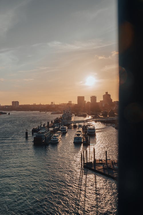 Ships Sailing on the Sea During Golden Hour 