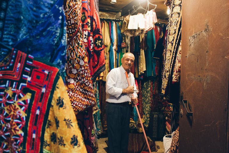 Elderly Man Working In Store