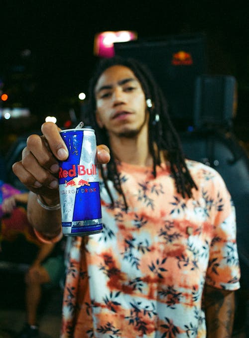 Free man Holding an Energy Drink Stock Photo
