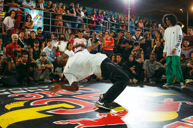 Men Breakdancing In Front Of An Audience 