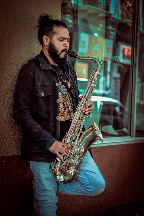 A Bearded Man Playing the Saxophone 