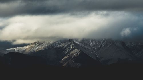 Free Majestic mountains of Patagonia under dramatic stormy clouds in Bariloche, Argentina. Stock Photo