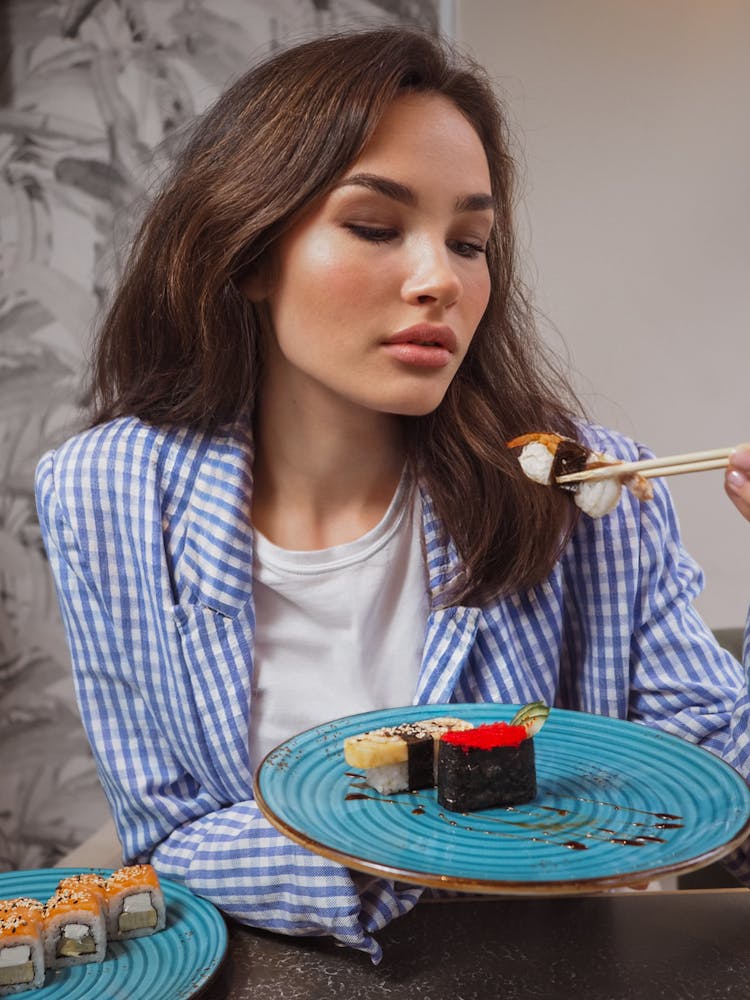 Woman Eating Japanese Food