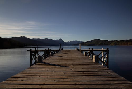 Brown Wooden Dock on Body of Water