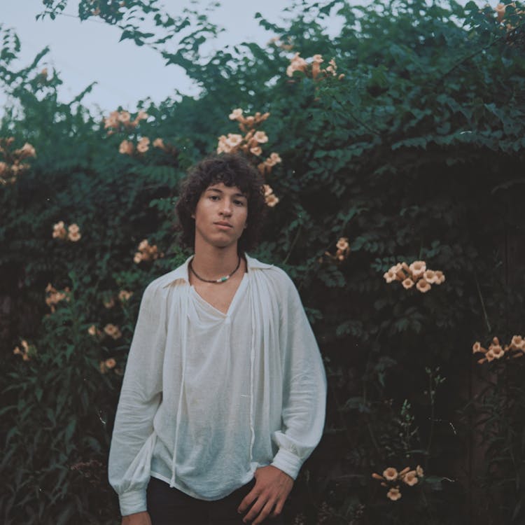 Stylish Man Posing In Garden 