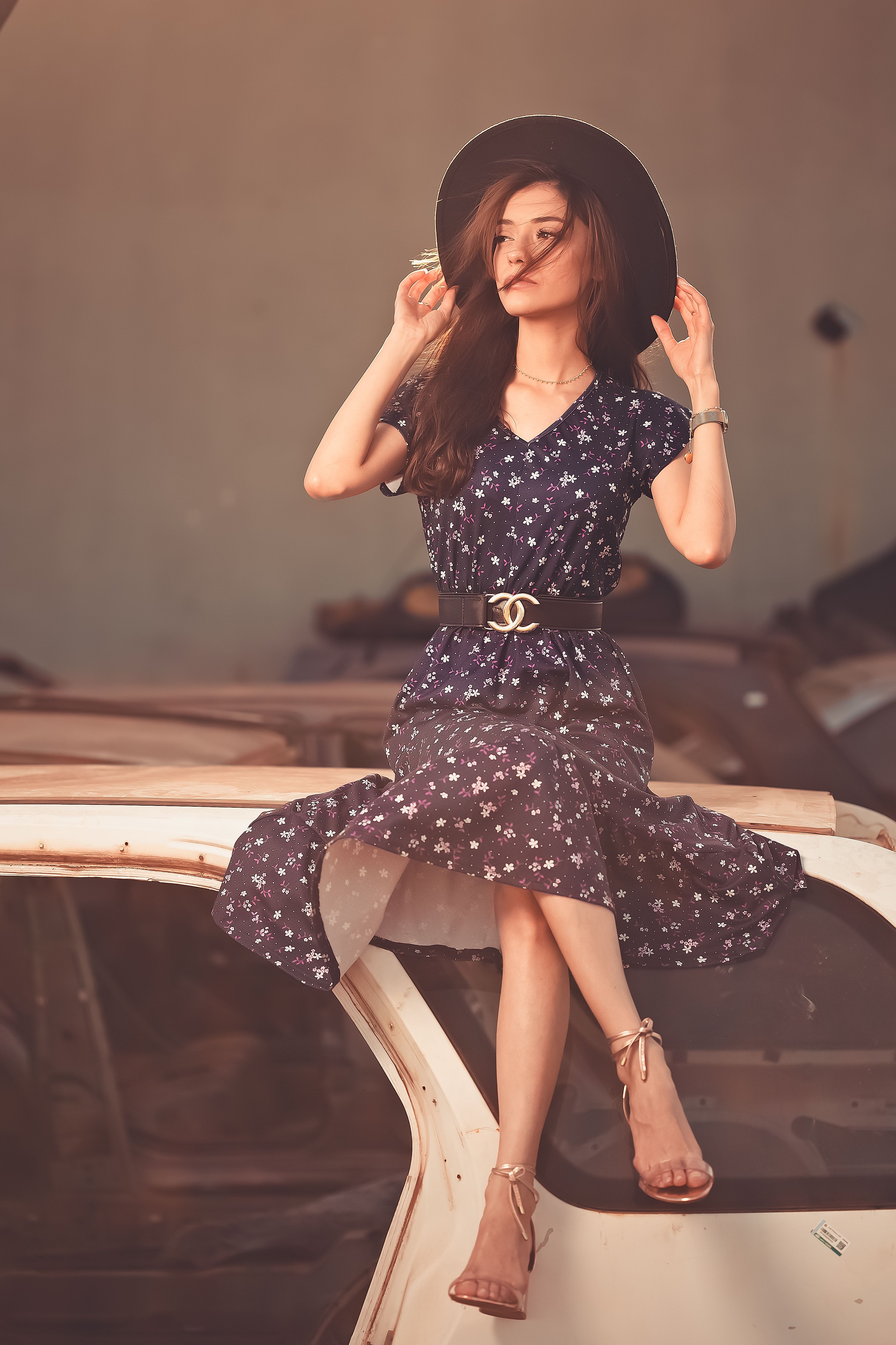 Woman in Floral Dress Wearing a Hat · Free Stock Photo