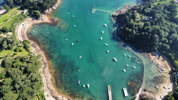 Aerial View Of White Boats On Lake