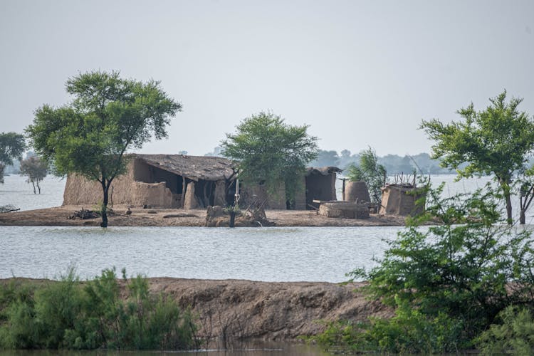 An Old Isolated House In The Middle Of Sea