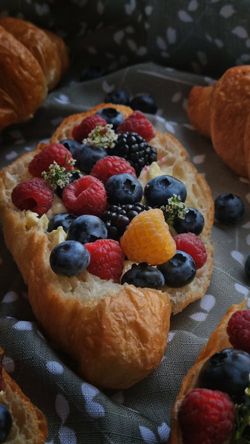 Close-Up Shot of Bread with Fruits on Top