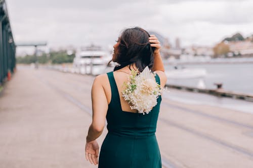 White Flowers on the Woman's Back 