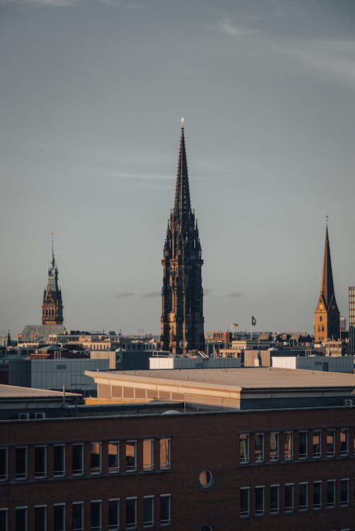 Brown and Black Tower Under Blue Sky