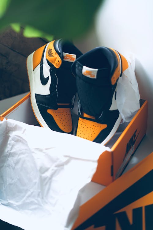 A Pair of Sneakers in a Box 