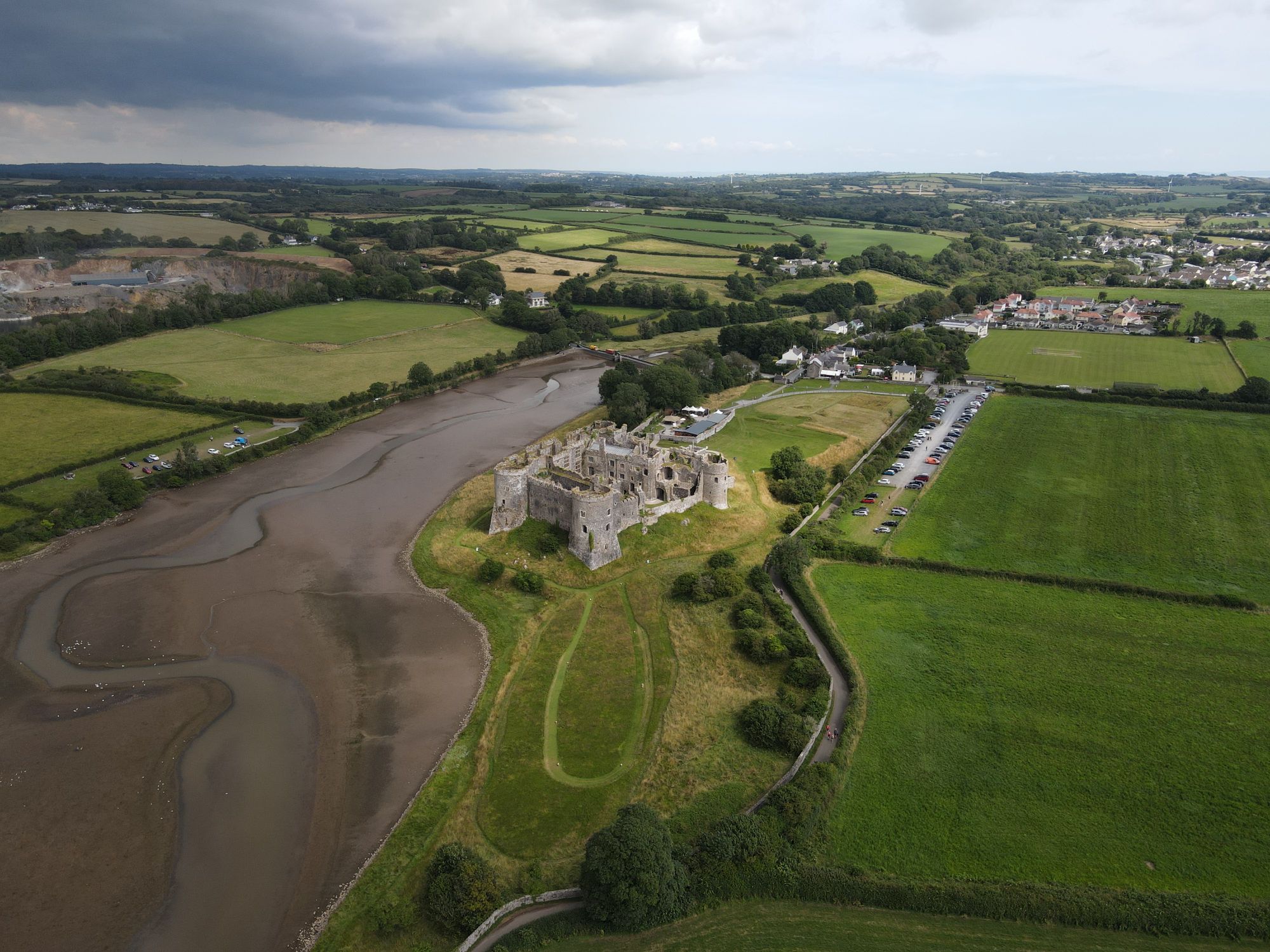 Aerial View of a Castle Beside the River · Free Stock Photo