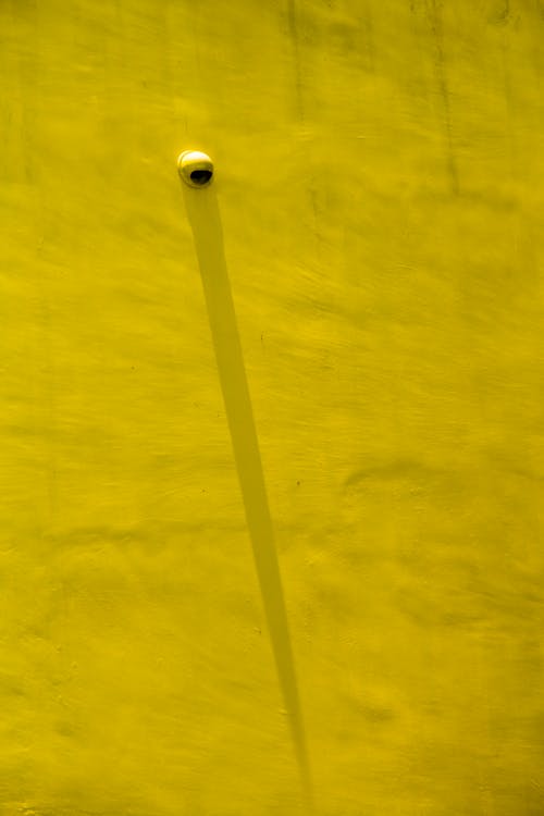 Shadow on a Yellow Wall 