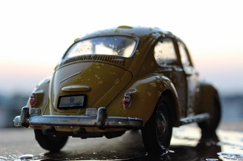 Close-up Photo of a Yellow Volkswagen Beetle 