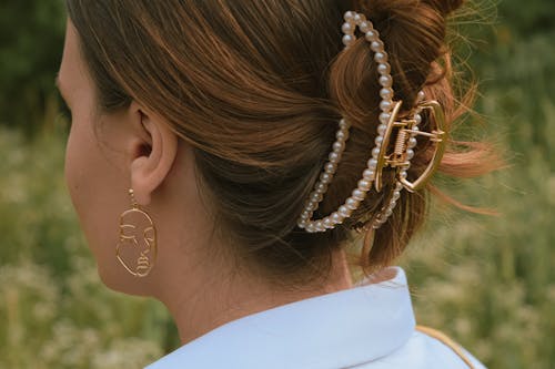 A Woman Wearing Pearl Hair Clip