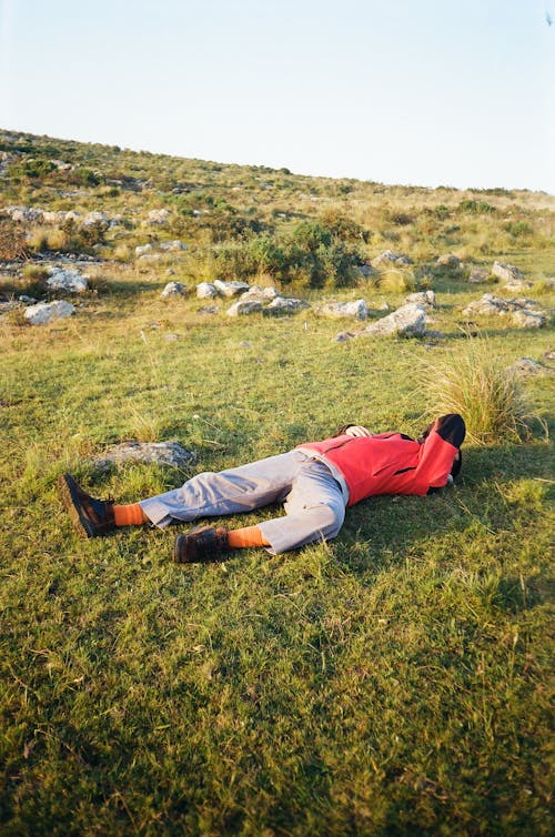Man Resting on Grass