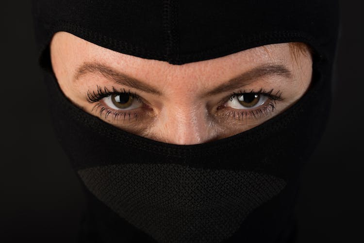 A Woman Wearing Black Mask