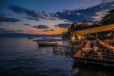 People In A Restaurant Beside Body Of Water in Ohrid, Macedonia