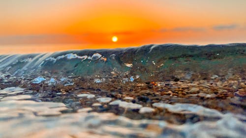 Ingyenes stockfotó hullámok, Napkelte, napkelte a hullámok felett témában