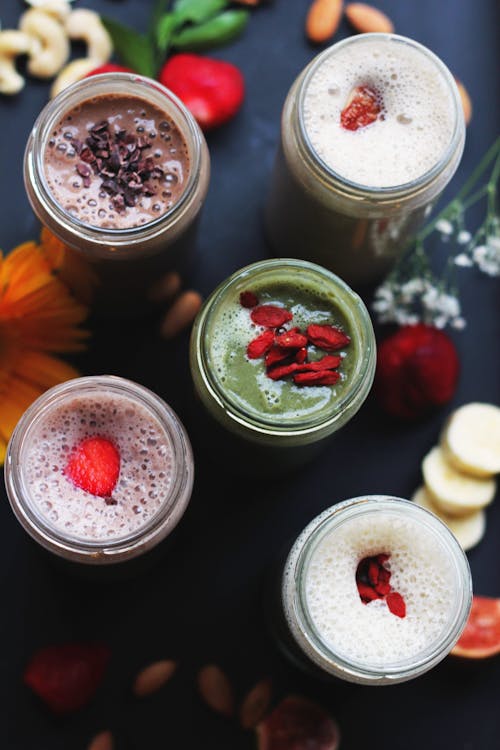 Five Assorted-flavor Milkshakes in Glass Jars