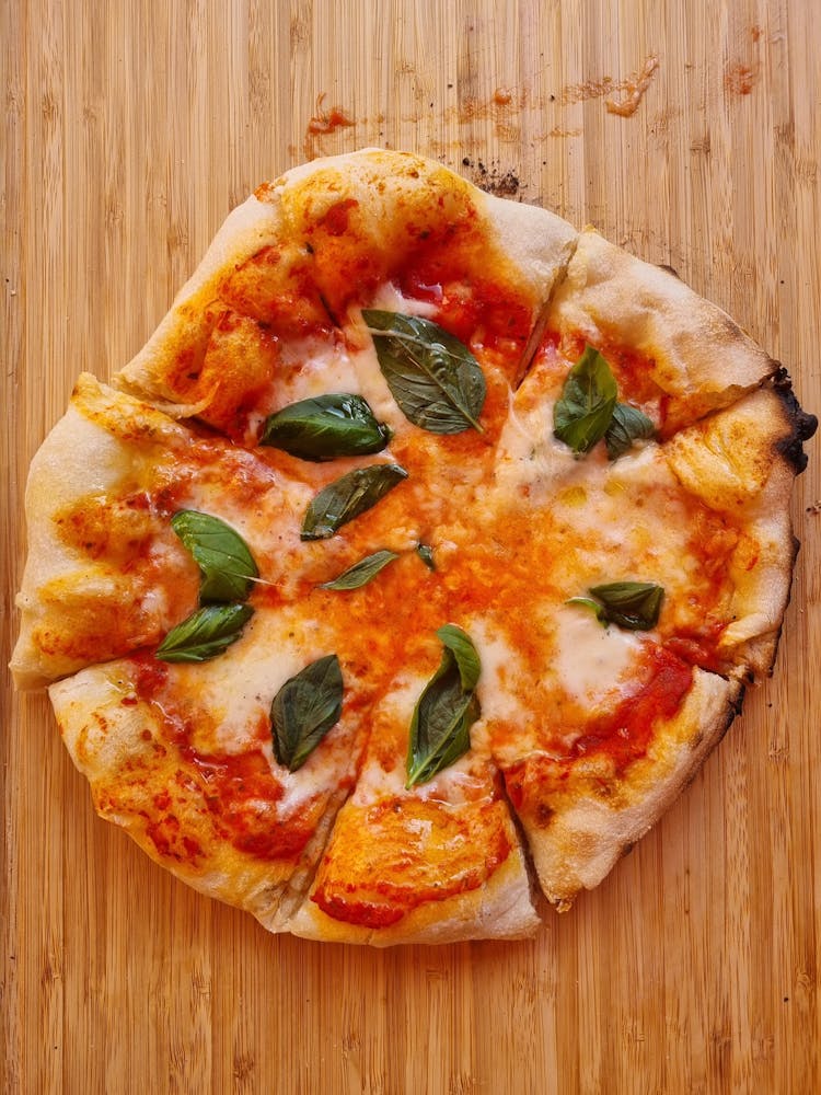 Pizza With Basil Leaves