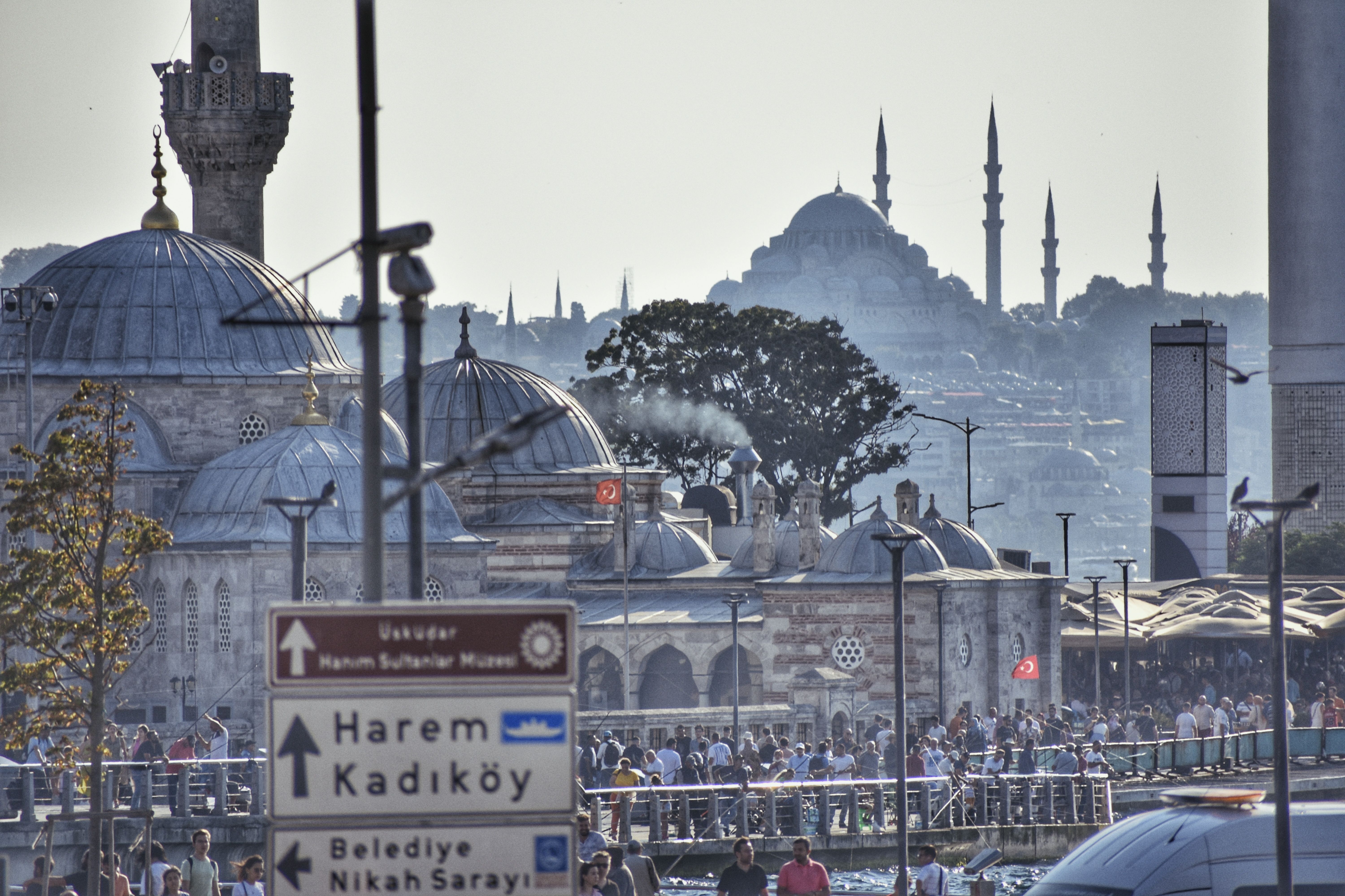 A busy street in Istanbul featuring the Suleymaniye Mosque, capturing the vibrant urban life.