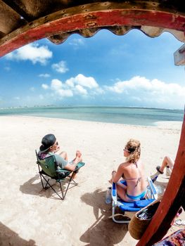 Enjoy a sunny day at Adicora's pristine beach with a scenic ocean view, perfect for leisure and vacation.