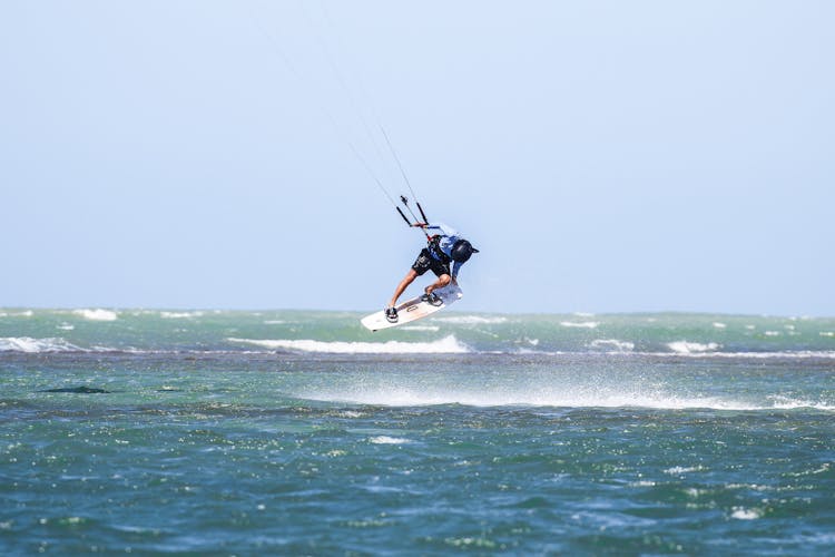 A Person Para Surfing On The Sea