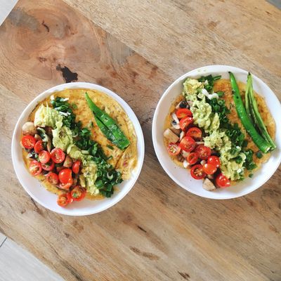 Scrambled eggs with avocado and tomato, photo by Alisha Mishra on Pexels