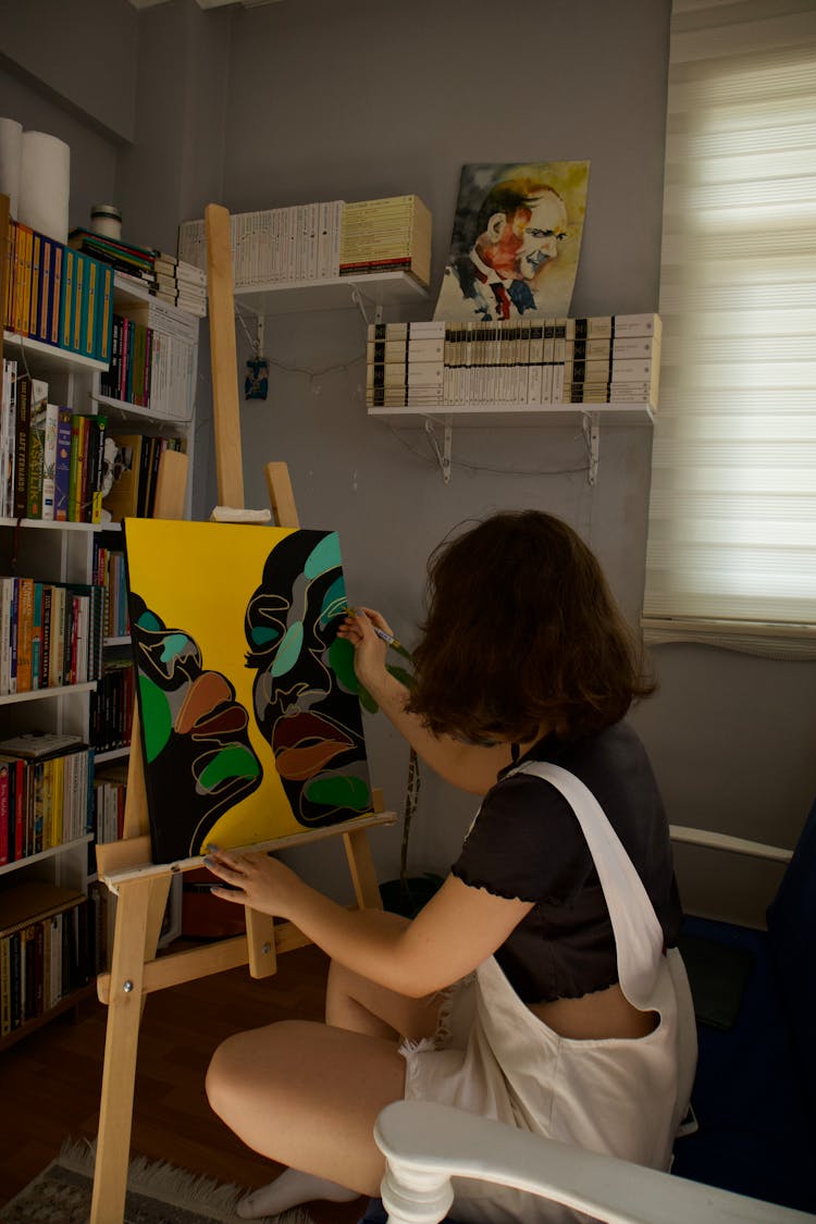 Woman Painting In Living Room