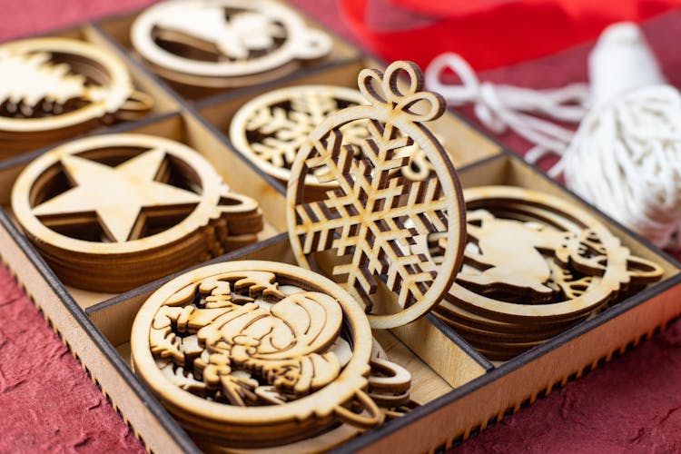 Wooden Christmas Ornaments On A Box