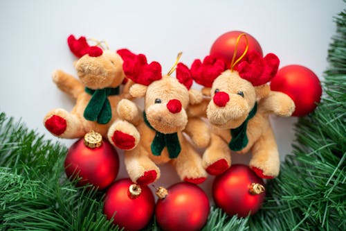 Reindeer Stuffed Toys and Red Christmas Balls