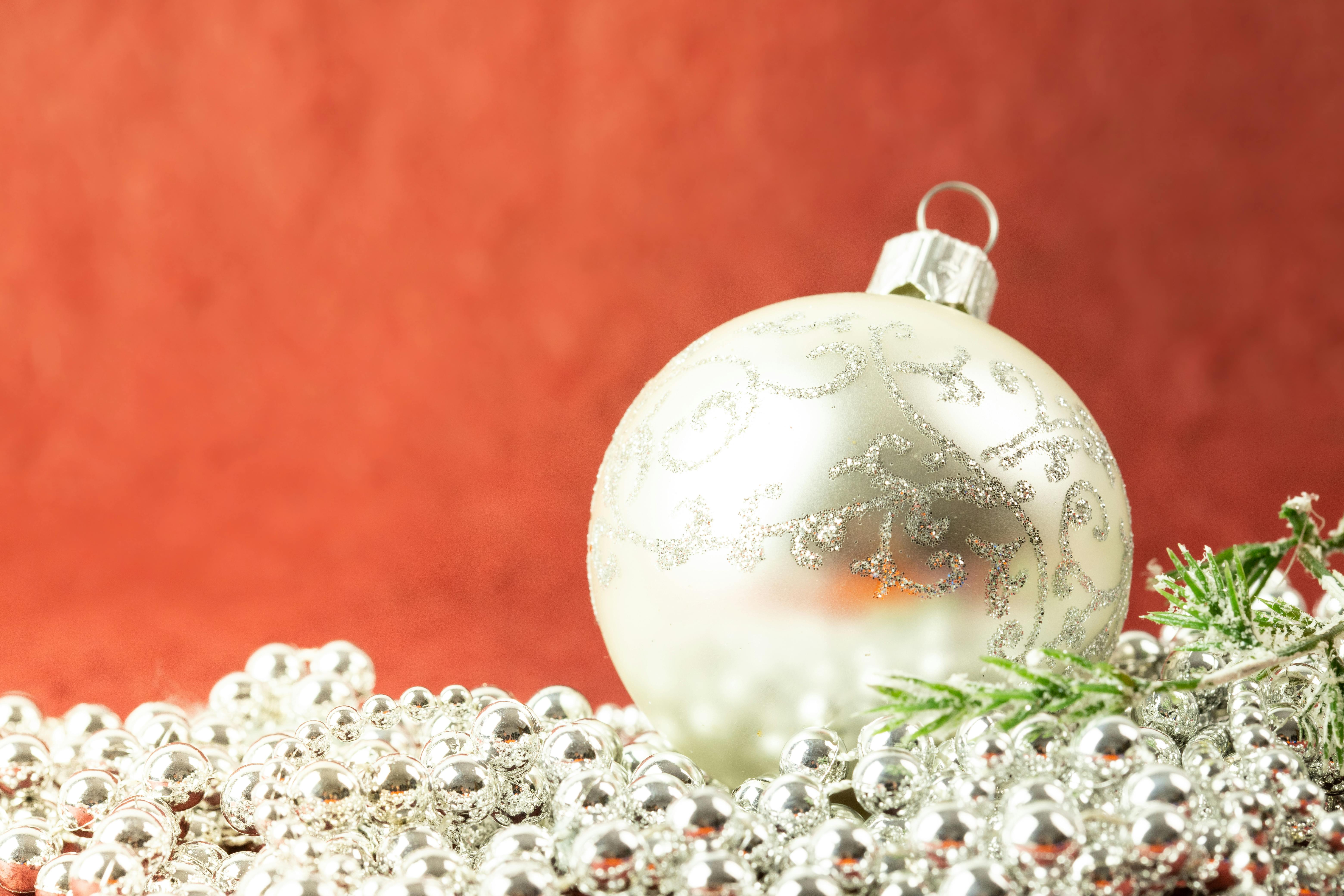 A Close-Up Shot of Hanging Christmas Tree Ornaments · Free Stock Photo