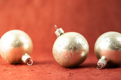 Close-Up Photo of Silver Baubles