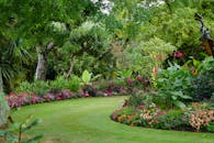 Grass Covered Pathway on a Garden