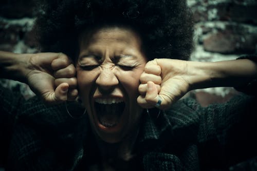 Close-up Photo of Screaming Woman 