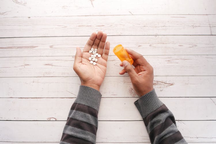 Medication On A Person's Palm 